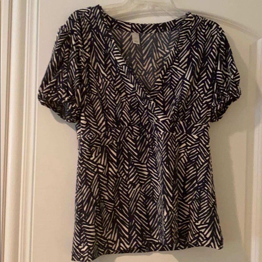 Blue and white patterned blouse